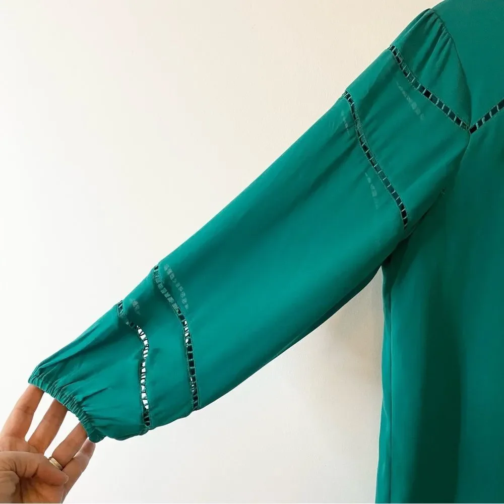 Ann Taylor Loft green jewel toned blouse with cut out detail size S.